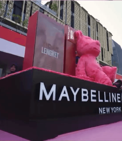 Pink Teddy statue on the Maybelline New York stage at a brand event in Indonesia